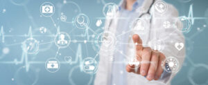 Doctor pointing at digital healthcare icons