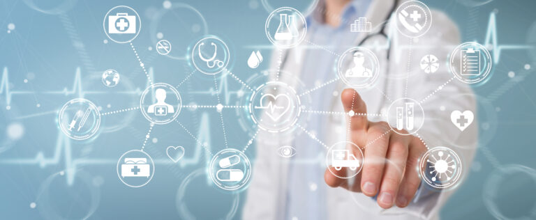 Doctor pointing at digital healthcare icons