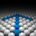 Blue spheres forming upward arrow among white spheres